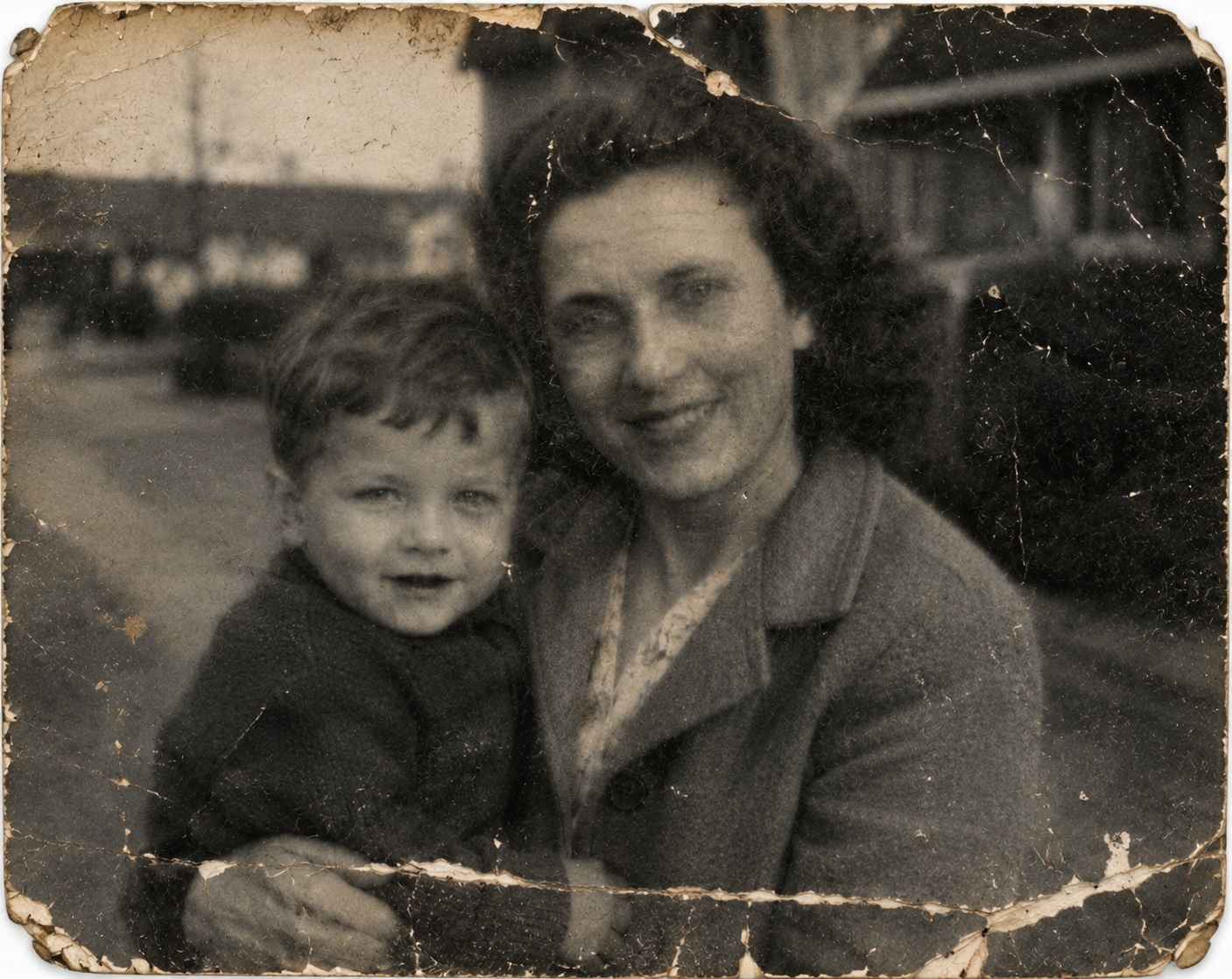 Before restoration — severely damaged old family photograph